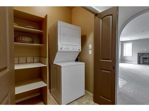 105-37411 Waskasoo Avenue, Rural Red Deer County, AB - Indoor Photo Showing Laundry Room