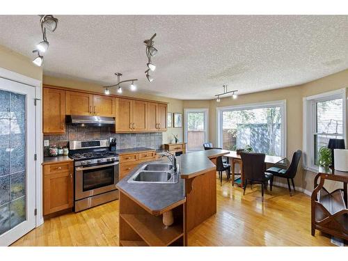 155 Harvest Oak View Ne, Calgary, AB - Indoor Photo Showing Kitchen With Stainless Steel Kitchen With Double Sink