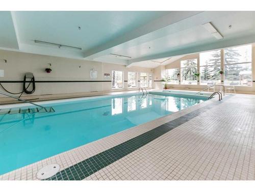 205-4512 52 Avenue, Red Deer, AB - Indoor Photo Showing Other Room With In Ground Pool