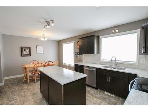 68 Lancaster Drive, Red Deer, AB - Indoor Photo Showing Kitchen With Double Sink