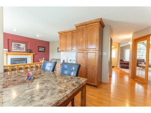 4102 66 Street, Stettler, AB - Indoor Photo Showing Other Room With Fireplace