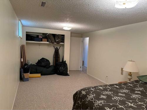 5106 A-61 Avenue, Ponoka, AB - Indoor Photo Showing Bedroom