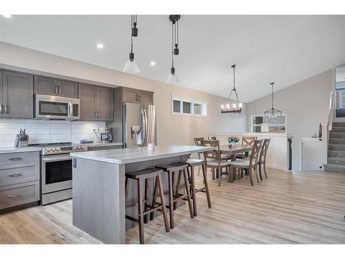 57 Mackenzie Avenue, Lacombe, AB - Indoor Photo Showing Kitchen With Upgraded Kitchen