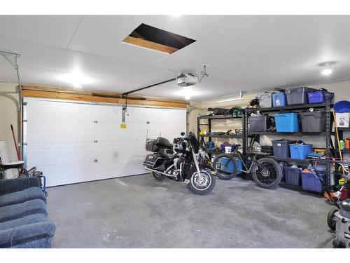 27 Lodge Place, Sylvan Lake, AB - Indoor Photo Showing Garage