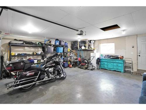 27 Lodge Place, Sylvan Lake, AB - Indoor Photo Showing Garage