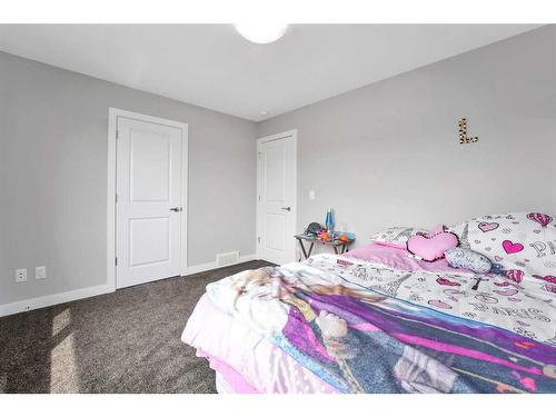 8 Victor Close, Sylvan Lake, AB - Indoor Photo Showing Bedroom