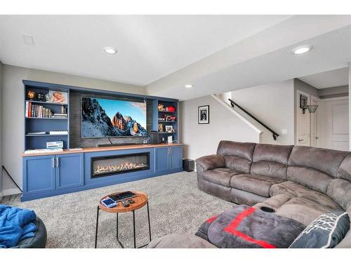 8 Victor Close, Sylvan Lake, AB - Indoor Photo Showing Living Room With Fireplace