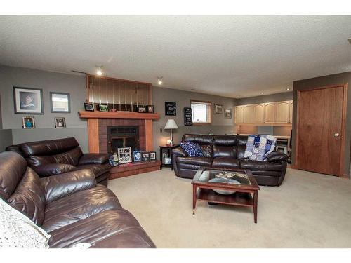 160 Eastman Crescent, Red Deer, AB - Indoor Photo Showing Living Room With Fireplace