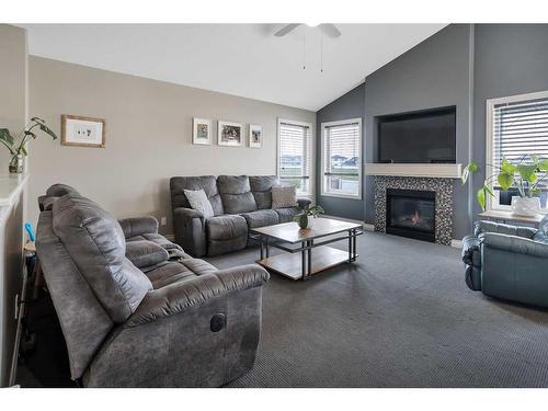 4280 Westbrooke Road, Blackfalds, AB - Indoor Photo Showing Living Room With Fireplace