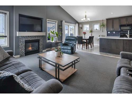 4280 Westbrooke Road, Blackfalds, AB - Indoor Photo Showing Living Room With Fireplace