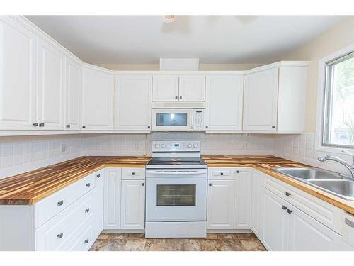 5203 First Ave East, Boyle, AB - Indoor Photo Showing Kitchen With Double Sink