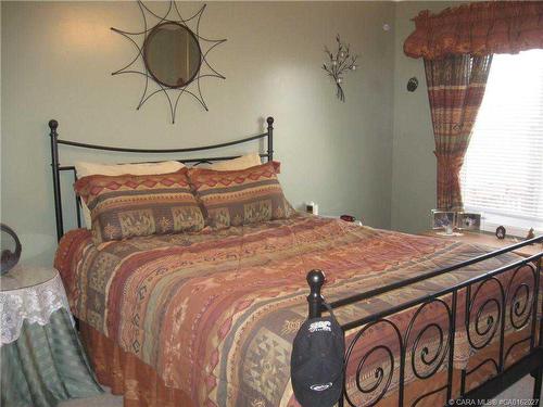 4021-25054 South Pine Lake Road, Rural Red Deer County, AB - Indoor Photo Showing Bedroom