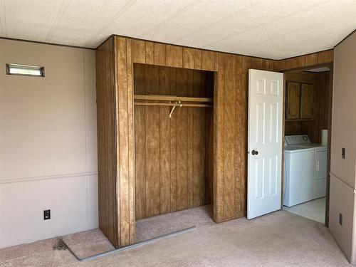 437 Lobstick Trail, Leslieville, AB - Indoor Photo Showing Laundry Room