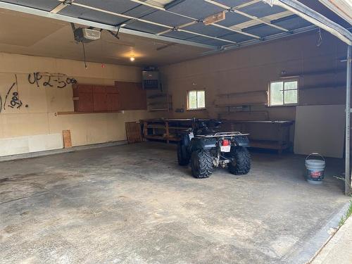 437 Lobstick Trail, Leslieville, AB - Indoor Photo Showing Garage