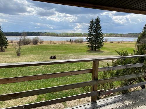 437 Lobstick Trail, Leslieville, AB - Outdoor With Body Of Water With View