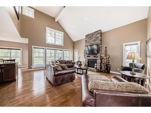 559 Summer Crescent, Rural Ponoka County, AB - Indoor Photo Showing Living Room With Fireplace