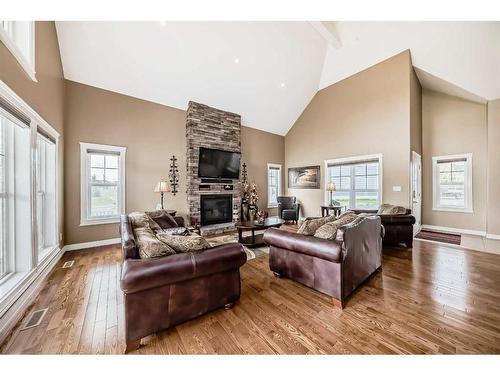 559 Summer Crescent, Rural Ponoka County, AB - Indoor Photo Showing Living Room With Fireplace