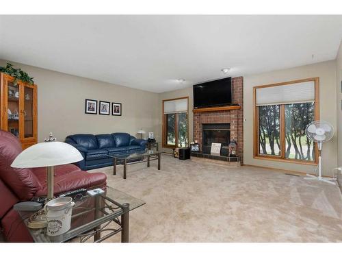 33 Mackenzie Drive, Sedgewick, AB - Indoor Photo Showing Living Room With Fireplace