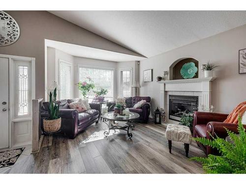 76 Ammeter Close, Red Deer, AB - Indoor Photo Showing Living Room With Fireplace
