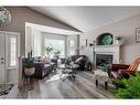 76 Ammeter Close, Red Deer, AB  - Indoor Photo Showing Living Room With Fireplace 