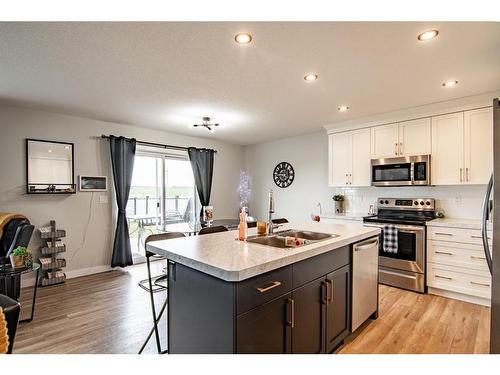 35 Thayer Close, Red Deer, AB - Indoor Photo Showing Kitchen With Stainless Steel Kitchen With Double Sink