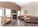 149 Sutherland Close, Red Deer, AB  - Indoor Photo Showing Living Room With Fireplace 
