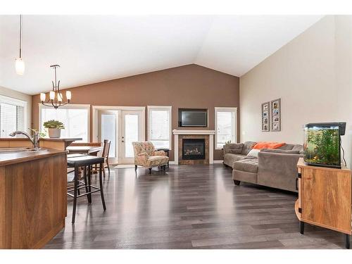 149 Sutherland Close, Red Deer, AB - Indoor Photo Showing Living Room With Fireplace