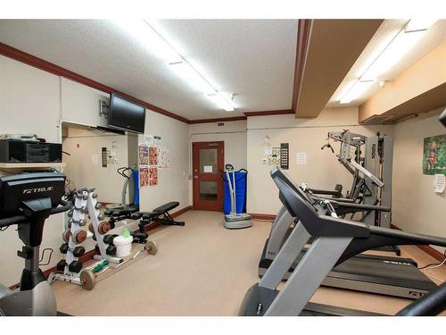 211-5300 48 Street, Red Deer, AB - Indoor Photo Showing Gym Room