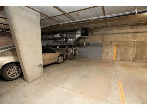 211-5300 48 Street, Red Deer, AB - Indoor Photo Showing Garage