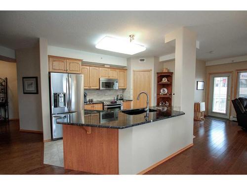 211-5300 48 Street, Red Deer, AB - Indoor Photo Showing Kitchen With Stainless Steel Kitchen