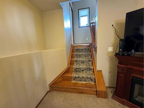 372 Lancaster Drive, Red Deer, AB - Indoor Photo Showing Other Room With Fireplace