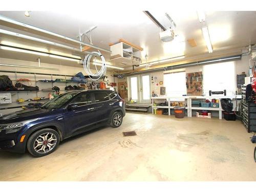 53 Otterbury Avenue, Red Deer, AB - Indoor Photo Showing Garage