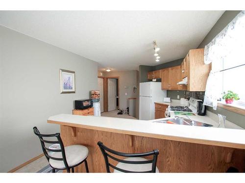 66 James Street, Red Deer, AB - Indoor Photo Showing Kitchen With Double Sink
