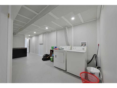 5303 47 Street, Alix, AB - Indoor Photo Showing Laundry Room