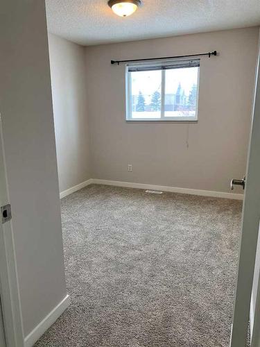104B-4917 68 Street, Camrose, AB - Indoor Photo Showing Other Room