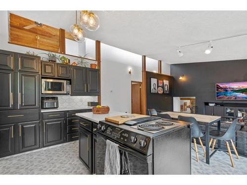 12 Muldrew Crescent, Red Deer, AB - Indoor Photo Showing Kitchen With Upgraded Kitchen