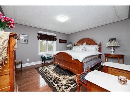 21 Rosedale Avenue, Rural Lacombe County, AB - Indoor Photo Showing Bedroom