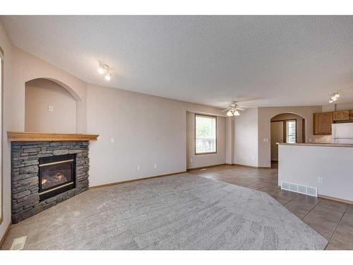103 Jenkins Drive, Red Deer, AB - Indoor Photo Showing Living Room With Fireplace