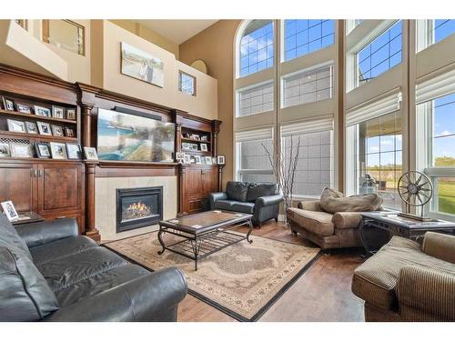 4300 Memorial Trail, Sylvan Lake, AB - Indoor Photo Showing Living Room With Fireplace