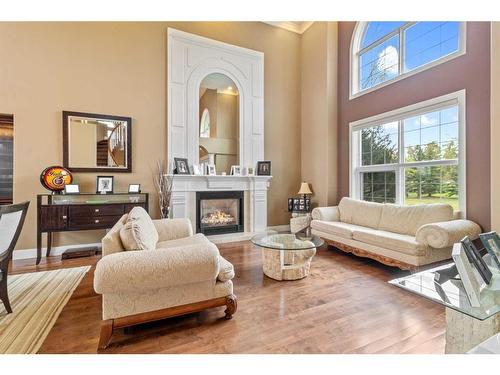 4300 Memorial Trail, Sylvan Lake, AB - Indoor Photo Showing Living Room With Fireplace