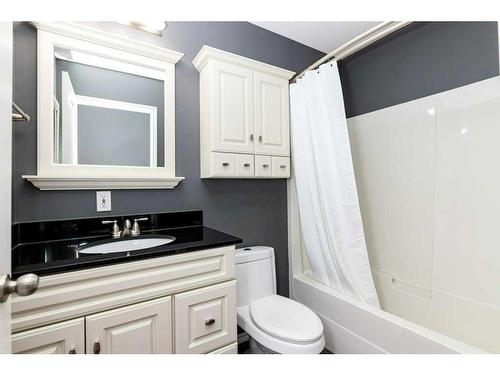 10 Ravenscrag Crescent, Norglenwold, AB - Indoor Photo Showing Bathroom