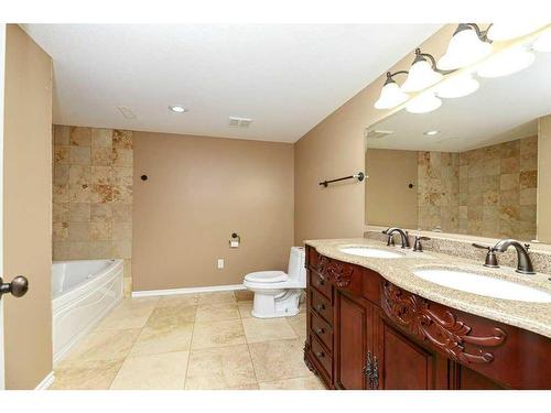 10 Ravenscrag Crescent, Norglenwold, AB - Indoor Photo Showing Bathroom