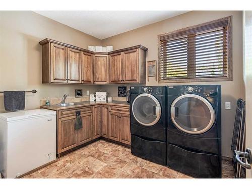 301 Jarvis Glen Court, Jarvis Bay, AB - Indoor Photo Showing Laundry Room