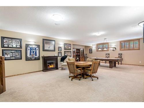 301 Jarvis Glen Court, Jarvis Bay, AB - Indoor With Fireplace