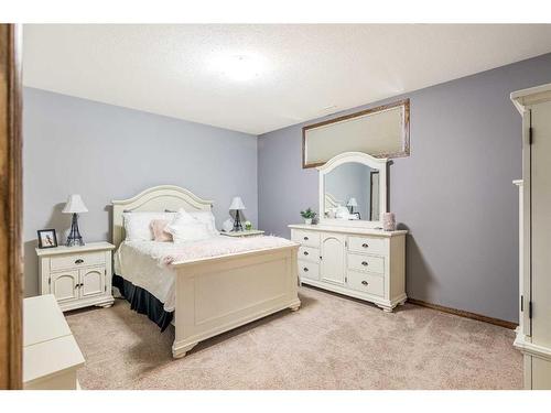 301 Jarvis Glen Court, Jarvis Bay, AB - Indoor Photo Showing Bedroom