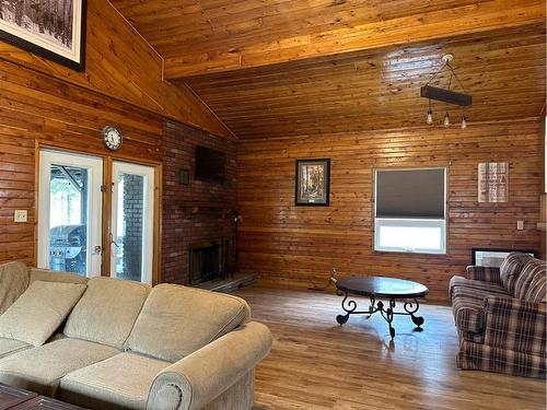 126 David Drive, Whispering Hills, AB - Indoor Photo Showing Living Room With Fireplace