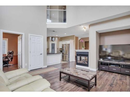 2 Garrison Place, Red Deer, AB - Indoor Photo Showing Living Room With Fireplace