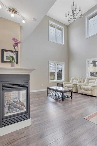 2 Garrison Place, Red Deer, AB - Indoor Photo Showing Living Room With Fireplace