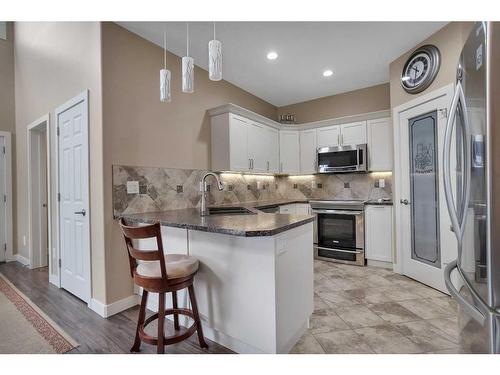 2 Garrison Place, Red Deer, AB - Indoor Photo Showing Kitchen With Upgraded Kitchen