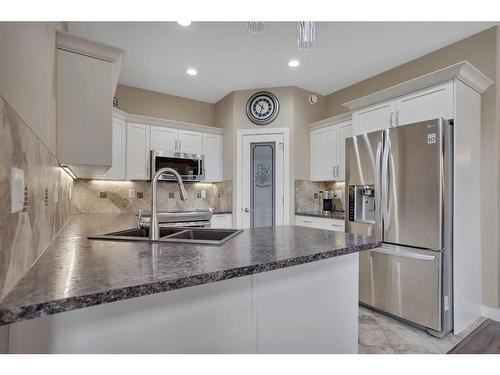 2 Garrison Place, Red Deer, AB - Indoor Photo Showing Kitchen With Double Sink With Upgraded Kitchen